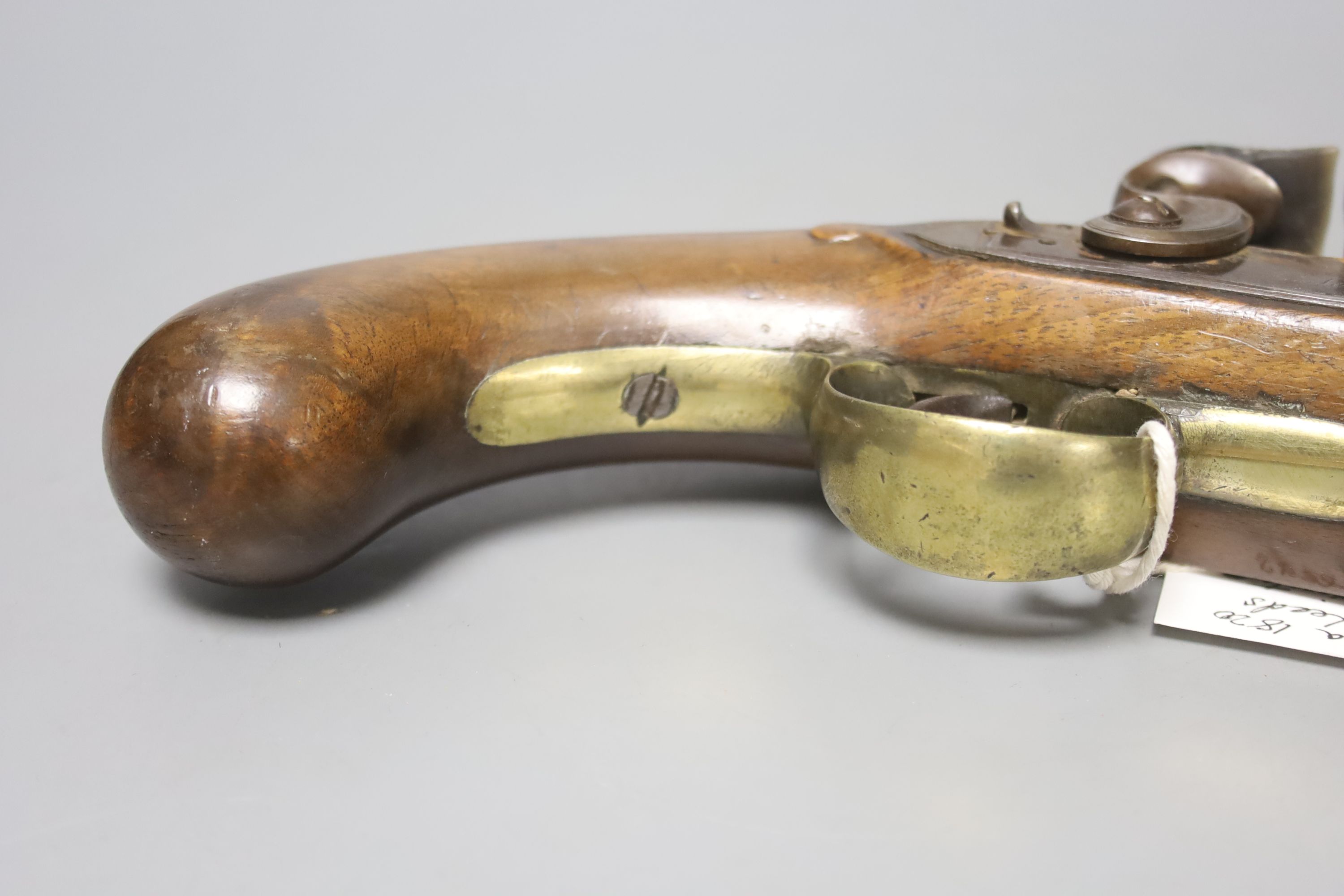 A flintlock coach pistol, circa 1820 by John and William Calvetrt of Leeds, approx. 35cm long